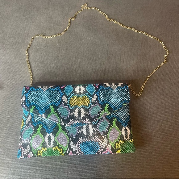 Fashion Nova Handbags - Snake print/colored purse with additional gold chair accessories